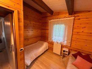 Postel nebo postele na pokoji v ubytování Chalet Lilly Andalo Relax & Sport