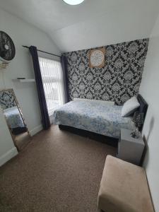 Ένα ή περισσότερα κρεβάτια σε δωμάτιο στο Private Room In Cardiff