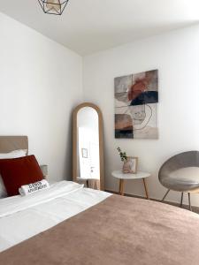 Una cama o camas en una habitación de Danin apartmani