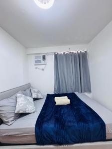 صورة لـ Davao 1BR Condo for 4 with Pool Near SM Lanang and Airport في مدينة دافاو