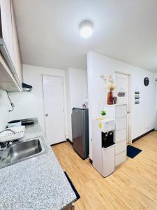 صورة لـ Davao 1BR Condo for 4 with Pool Near SM Lanang and Airport في مدينة دافاو