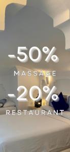 un signe pour une salle maximale massapex dans l'établissement Hotel Al Alba Hammam & Restaurant, à Assilah