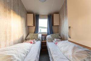 Katil atau katil-katil dalam bilik di Captain's Quarters B67