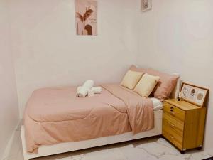 Ένα ή περισσότερα κρεβάτια σε δωμάτιο στο JMary's Stayhouse