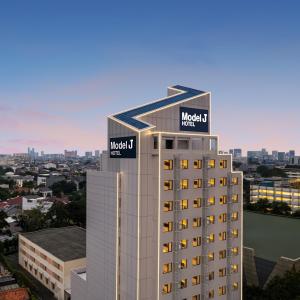 a view of a building with the words model hotel at Model J Hotel Jakarta Central Park 曼居酒店 雅加达中央公园店 in Jakarta
