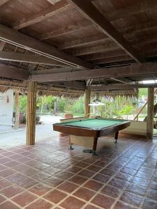 a pool table in the middle of a patio at Coral Cay Resort, Inc. in Siquijor