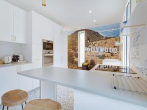 Η κουζίνα ή μικρή κουζίνα στο Villa Marilyn proche St Germain en Laye-Versailles