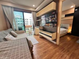 En eller flere senge i et værelse på DUSIT Grand Park GARDEN VIEW + 41 billeder