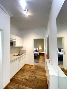 Kuchyň nebo kuchyňský kout v ubytování Haven Hotels - Helvetia Suites Düsseldorf City