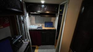 Kuchyň nebo kuchyňský kout v ubytování Caravan Experience