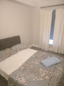 Postel nebo postele na pokoji v ubytování Dublin Sea Room