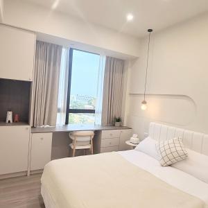 Postel nebo postele na pokoji v ubytování 木光寓斗六全新電梯公寓含有客廳 + 7 fotografií