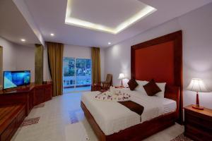 Televisyen dan/atau pusat hiburan di Shadow Angkor Residence