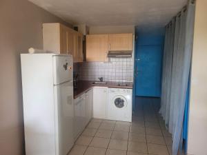 Kuchyň nebo kuchyňský kout v ubytování studio front de mer LE BARCARES