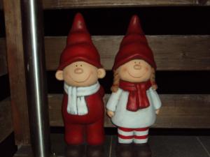 two christmas ornaments are sitting on a shelf at Gemütliches Ferienhaus In Hart Im Zillertal in Hart im Zillertal +24 photos