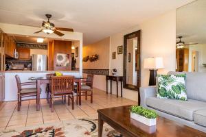 a living room with a couch and a table at Kihei Akahi D402 · AKH D402 2BD Condo Across Beach Ocean View AC in Wailea