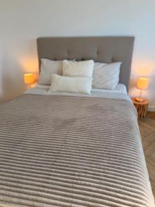 Ένα ή περισσότερα κρεβάτια σε δωμάτιο στο Przytulne Studio Blisko Morza