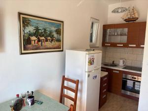 Η κουζίνα ή μικρή κουζίνα στο Nemira IX 12 Vacations