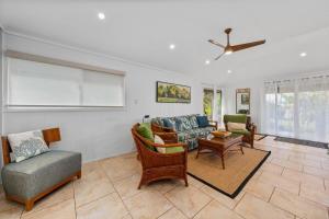a living room with a couch and chairs at International Colony Club 16 · ICC 16 Plantation Style 2BD Cotta in Lahaina