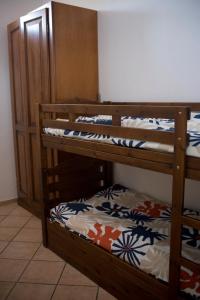 Ένα ή περισσότερα κρεβάτια σε δωμάτιο στο Ca' D'la Pèisa