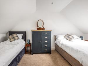 Voodi või voodid majutusasutuse Seaton Orangery toas