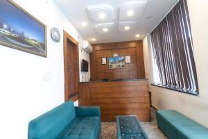 a court room with a bench and a judgeasteryasteryasteryasteryasteryasteryastery at Hotel Parth Inn in Rishīkesh