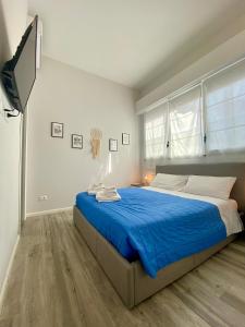 En eller flere senge i et værelse på Dream Catcher Apartment