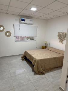Una cama o camas en una habitación de La Quinta de Juanillo 7 fotos más