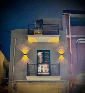 a building with a clock on the side of it at HOME BUCISCA- Your days of relaxation in CTA