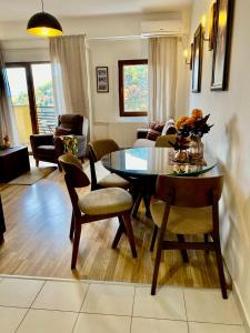 a living room with a table and chairs at Moun2 in Mavrovo +34 photos