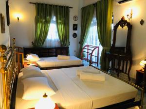 Ένα ή περισσότερα κρεβάτια σε δωμάτιο στο Fair Heaven Villa +9 φωτογραφίες