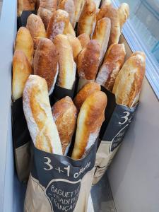 a bunch of bagels are sitting on a table at Cozy vacation home in Langeais in Langeais