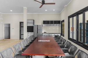 a conference room with a long table and chairs at 9 Bedroom Villa Mui Ne With Private Pool in Mui Ne +91 photos