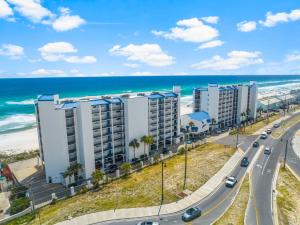 an aerial view of a building near the beach at AquaVista Beach Resort by Panhandle Getaways in Panama City Beach +12 photos
