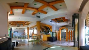 Χώρος καθιστικού στο Hotel Sfinks