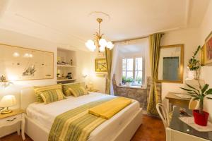 Postel nebo postele na pokoji v ubytování Mia Casa Dubrovnik