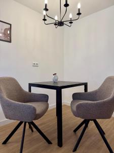 Posezení v ubytování Zentrales Studio-Appartment mit Terrasse