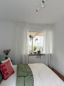 Postel nebo postele na pokoji v ubytování Waldnah wohnen Zirndorf