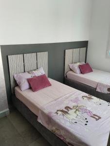 Katil atau katil-katil dalam bilik di Beautiful appartment with a glorious sea view