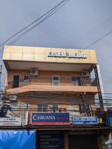 a building with a sign on top of it at L'islo INN in Davao City