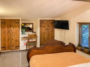 Μια τηλεόραση ή/και κέντρο ψυχαγωγίας στο Bluebell Cottage - 27635