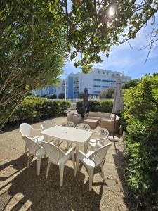 En have udenfor Evasion Marine Plage Terrasse parking clim + 18 billeder