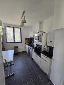 Køkken eller tekøkken på Evasion Marine Plage Terrasse parking clim