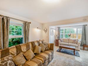 Posezení v ubytování Nurseries Cottage