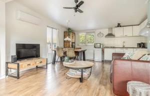 a living room with a couch and a table at Beautiful Home In Erm With Wifi in Erm