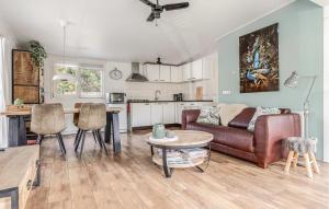 a living room with a couch and a table at Beautiful Home In Erm With Wifi in Erm