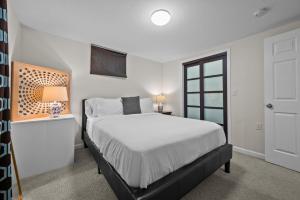 a bedroom with a large bed and a window at 1815 Bluebell Ave in Boulder
