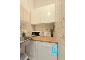 Η κουζίνα ή μικρή κουζίνα στο Jungle Room Old Town Gdansk