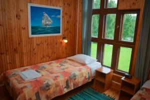 Ліжко або ліжка в номері Jöekalda Accommodation