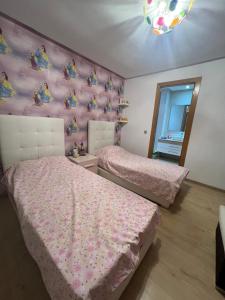 Ένα ή περισσότερα κρεβάτια σε δωμάτιο στο Beach appartement